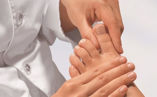 a specialist examines the legs for a fungal infection